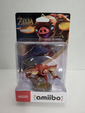 Nintendo amiibo The Legend of Zelda: Breath of the Wild Bokoblin action figure in its original blister packaging, featuring a red pig-like creature with large ears and glowing blue eyes.